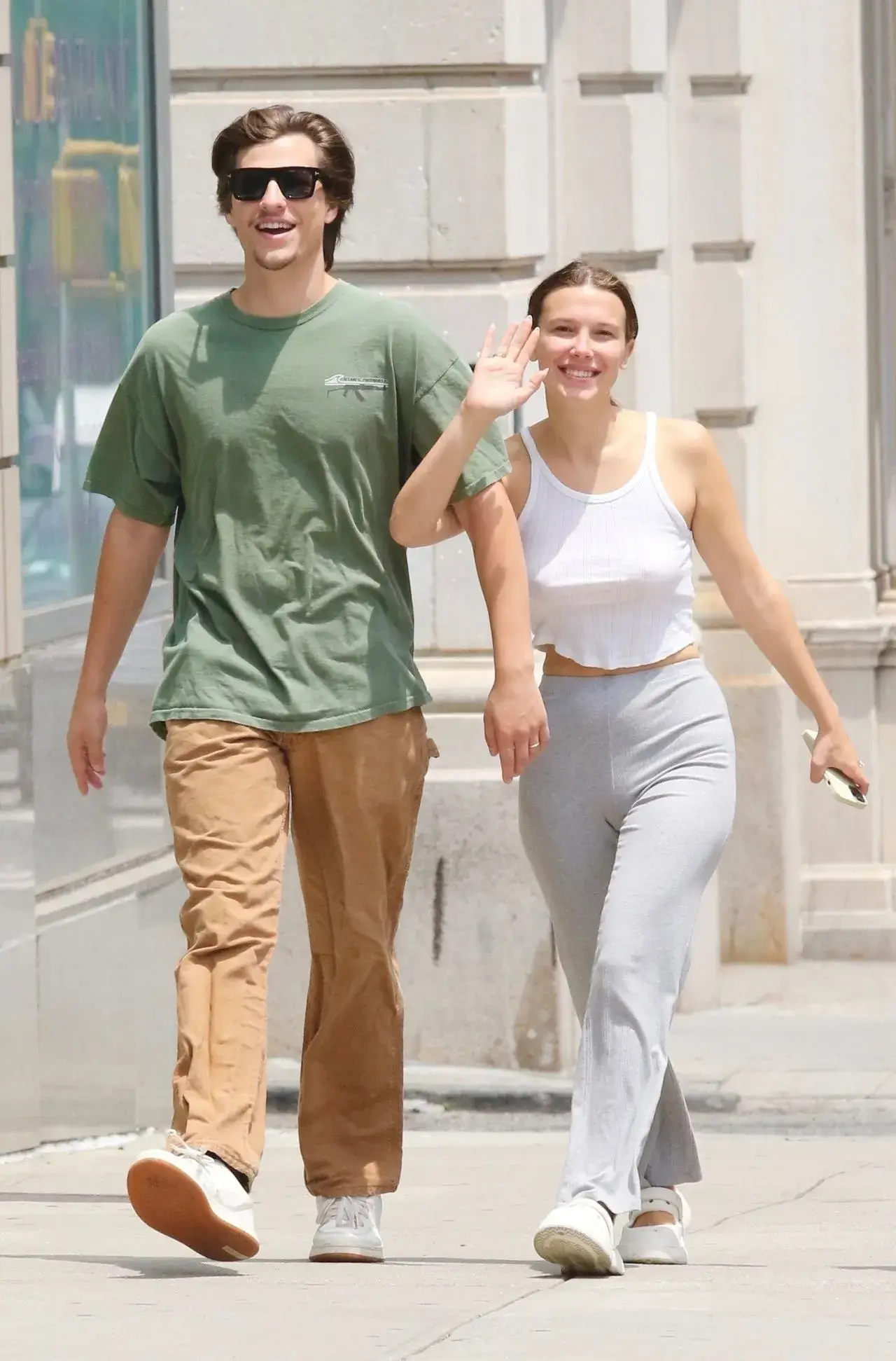 Millie Bobby Brown Stills in White Top Blue jeans in New York